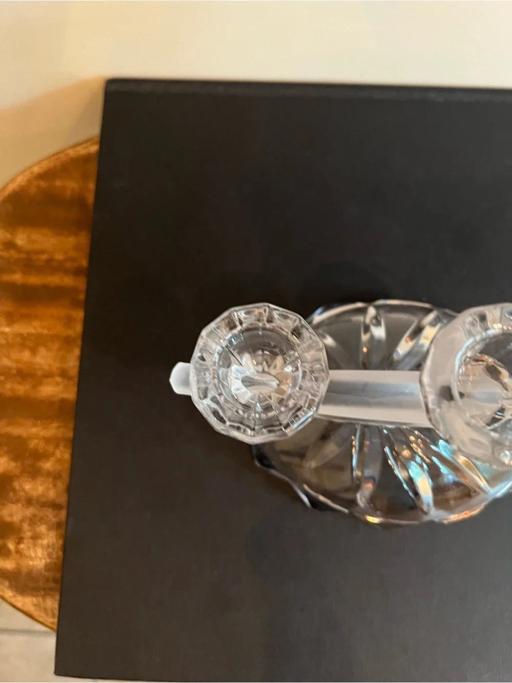 Glass candle holder Features a unique asymmetrical 